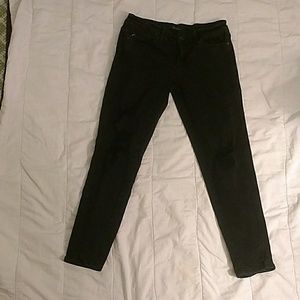 Distressed low-rise ankle jeans